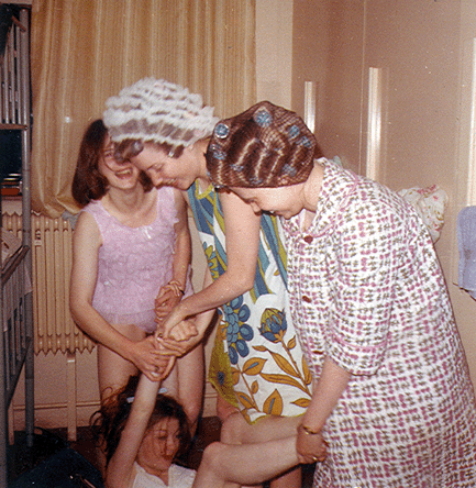 Gale Rhine  Dotty Hoeter  Sharon Vos  try to dust the floor with Pat "Ouiji" Percy